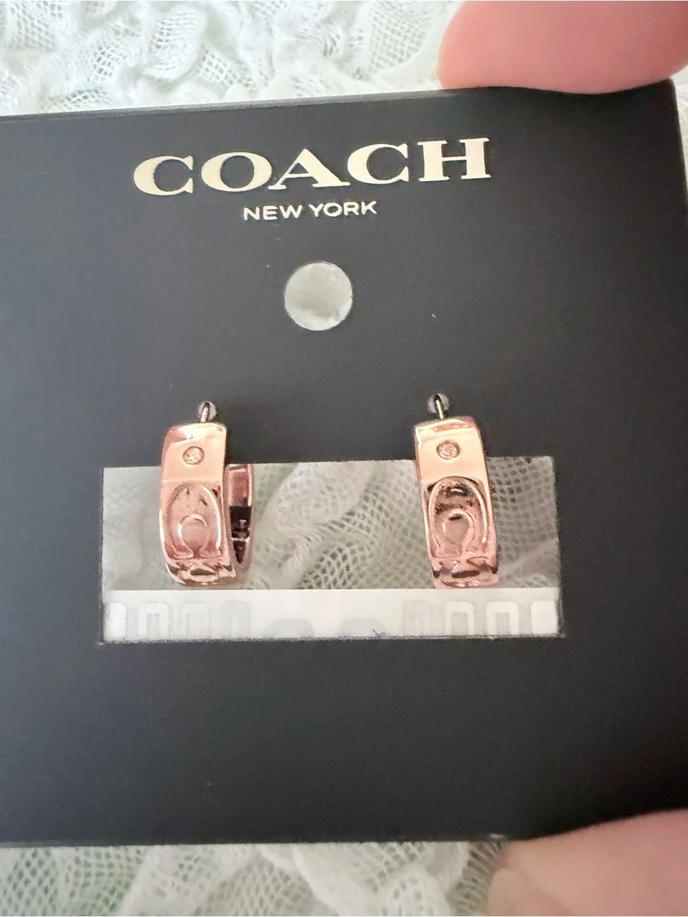 Coach Rose Gold Signature Embossed Huggie Earrings